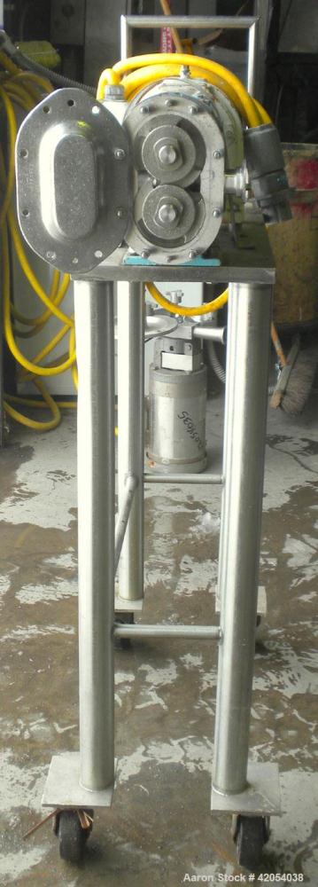 Used Waukesha Rotary Positive Displacement Pump, model 15, 316 stainless steel. Approximate 10 gallons per minute capacity, .013 gallon displacement per revolution. 1-1/2" sanitary inlet/outlet, (2) ...