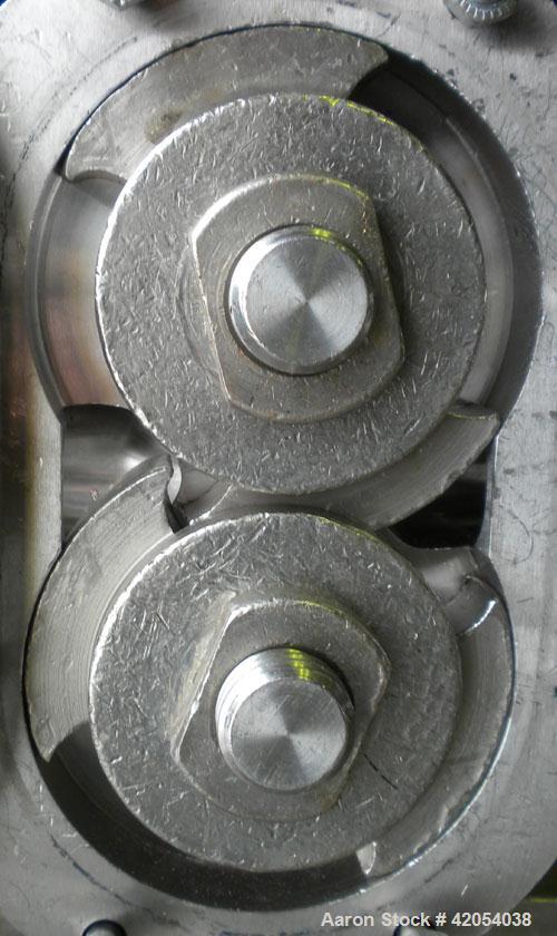 Used Waukesha Rotary Positive Displacement Pump, model 15, 316 stainless steel. Approximate 10 gallons per minute capacity, .013 gallon displacement per revolution. 1-1/2" sanitary inlet/outlet, (2) ...