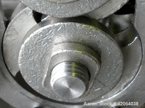 Used Waukesha Rotary Positive Displacement Pump, model 15, 316 stainless steel. Approximate 10 gallons per minute capacity, .013 gallon displacement per revolution. 1-1/2" sanitary inlet/outlet, (2) ...