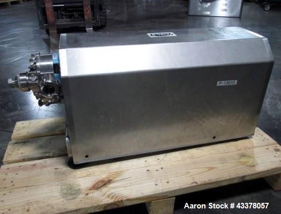 Used Waukesha Rotary Lobe Pump, Model 018, Stainless Steel. 1.5" Inlet/outlet, rated up to 20 gpm, on base with 1 hp, 230/460 volt motor drive, serial# 377392 05.
