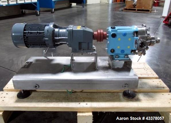 Used Waukesha Rotary Lobe Pump, Model 018, Stainless Steel. 1.5" Inlet/outlet, rated up to 20 gpm, on base with 1 hp, 230/460 volt motor drive, serial# 377392 05.