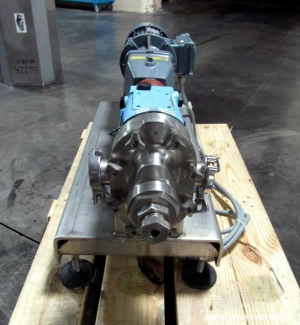 Used Waukesha Rotary Lobe Pump, Model 018, Stainless Steel. 1.5" Inlet/outlet, rated up to 20 gpm, on base with 1 hp, 230/460 volt motor drive, serial# 377392 05.