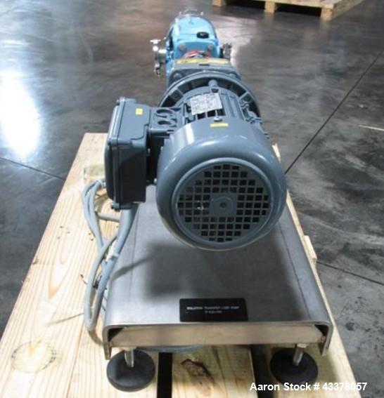 Used Waukesha Rotary Lobe Pump, Model 018, Stainless Steel. 1.5" Inlet/outlet, rated up to 20 gpm, on base with 1 hp, 230/460 volt motor drive, serial# 377392 05.