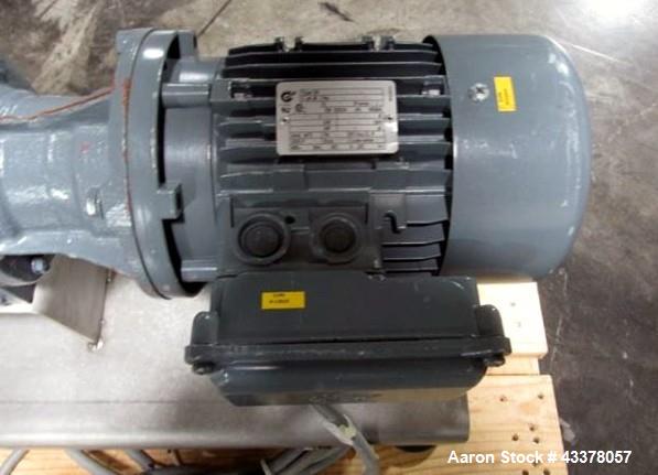Used Waukesha Rotary Lobe Pump, Model 018, Stainless Steel. 1.5" Inlet/outlet, rated up to 20 gpm, on base with 1 hp, 230/460 volt motor drive, serial# 377392 05.