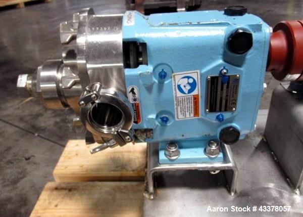 Used Waukesha Rotary Lobe Pump, Model 018, Stainless Steel. 1.5" Inlet/outlet, rated up to 20 gpm, on base with 1 hp, 230/460 volt motor drive, serial# 377392 05.