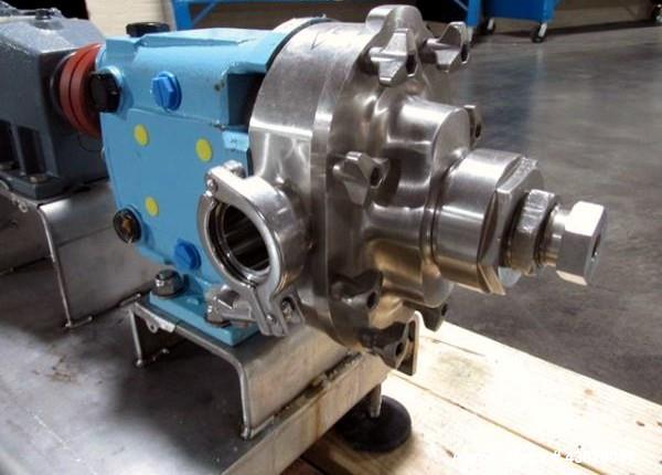 Used Waukesha Rotary Lobe Pump, Model 018, Stainless Steel. 1.5" Inlet/outlet, rated up to 20 gpm, on base with 1 hp, 230/460 volt motor drive, serial# 377392 05.