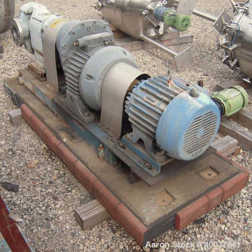 Used Waukesha Rotary Positive Displacement Pump, model 200, 316 stainless steel. Approximate capacity 260 gallons per minute. 4" inlet/outlet. Driven by a 15 hp, 3/60/230/460 volt, 1750 rpm motor thr...