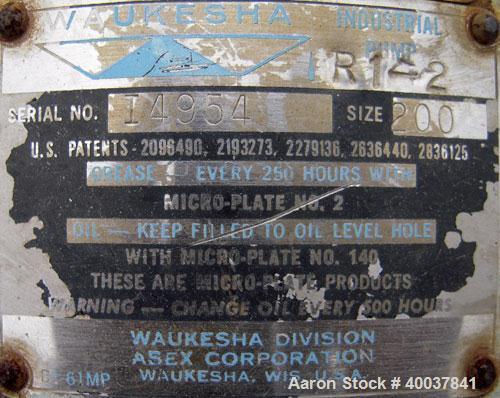 Used Waukesha Rotary Positive Displacement Pump, model 200, 316 stainless steel. Approximate capacity 260 gallons per minute. 4" inlet/outlet. Driven by a 15 hp, 3/60/230/460 volt, 1750 rpm motor thr...