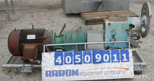 Used Waukesha Universal Rotary Positive Displacement Pump, Model 220, 316 stainless steel. Approximately 260 gallons per minute at 100 psi at 600 rpm capacity, .522 gallon displacement per revolution...
