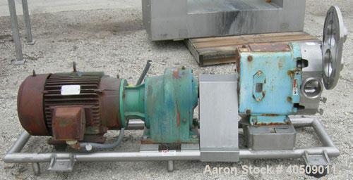Used Waukesha Universal Rotary Positive Displacement Pump, Model 220, 316 stainless steel. Approximately 260 gallons per minute at 100 psi at 600 rpm capacity, .522 gallon displacement per revolution...
