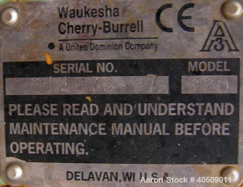 Used Waukesha Universal Rotary Positive Displacement Pump, Model 220, 316 stainless steel. Approximately 260 gallons per minute at 100 psi at 600 rpm capacity, .522 gallon displacement per revolution...