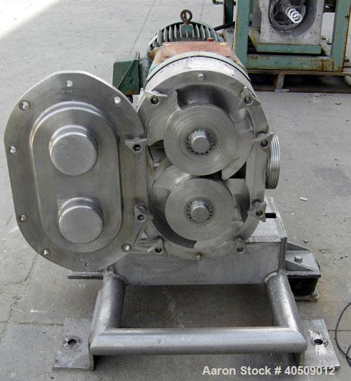 Used Waukesha Universal Rotary Positive Displacement Pump, model 220, 316 stainless steel. Approximately 260 gallons per minute at 100 psi at 600 rpm capacity, .522 gallon displacement per revolution...