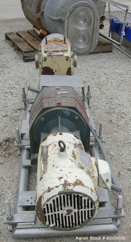 Used Waukesha Universal Rotary Positive Displacement Pump, model 220, 316 stainless steel. Approximately 260 gallons per minute at 100 psi at 600 rpm capacity, .522 gallon displacement per revolution...