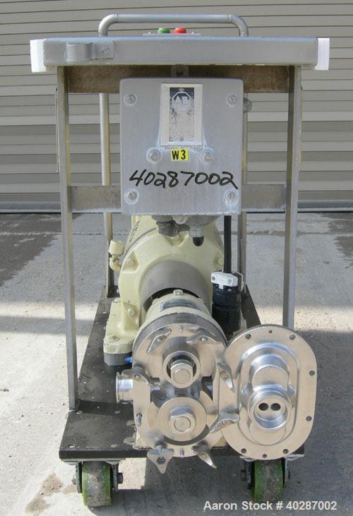 Used Waukesha Sanitary Positive Displacement Pump, model 25, 316 stainless steel.Approximate capacity .060 gallons per revolution, 25 gallons per minute. 1 1/2" triclamp inlet/outlet.(1) stainless st...