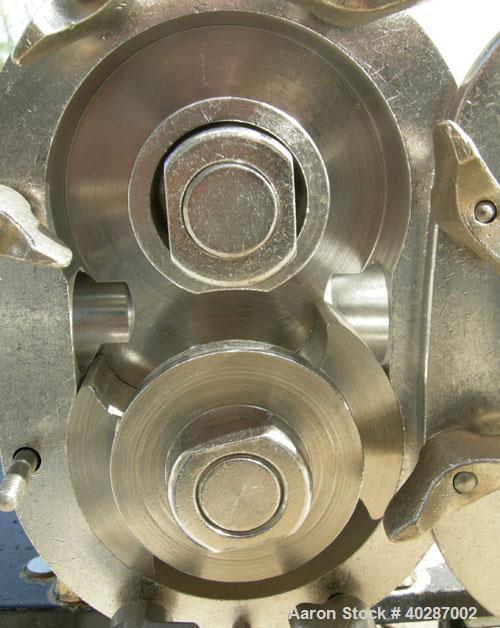 Used Waukesha Sanitary Positive Displacement Pump, model 25, 316 stainless steel.Approximate capacity .060 gallons per revolution, 25 gallons per minute. 1 1/2" triclamp inlet/outlet.(1) stainless st...