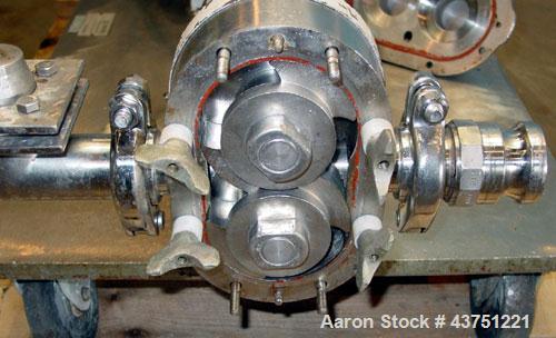 Used Waukesha Rotary Positive Displacement Pump, Model 25, 316 Stainless Steel. Approximately 25 gallons per minute. 2" Tri-clamp inlet/outlet, (2) stainless steel rotors, vented cover. Driven by a 3...