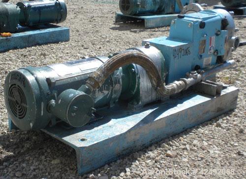 Used Waukesha Rotary Positive Displacement Pump, Model 030U2AP, 316 Stainless Steel. Approximately 36 gallons per minute at 100 psi at 600 rpm capacity, .06 gallon displacement per revolution. 1-1/2"...