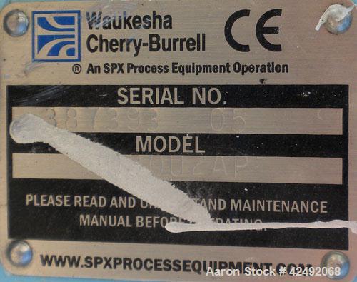 Used Waukesha Rotary Positive Displacement Pump, Model 030U2AP, 316 Stainless Steel. Approximately 36 gallons per minute at 100 psi at 600 rpm capacity, .06 gallon displacement per revolution. 1-1/2"...