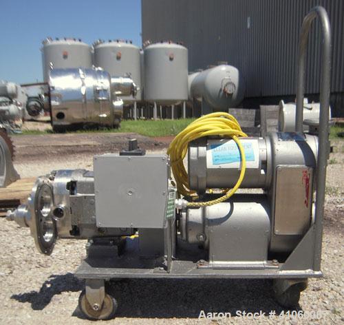 Used Waukesha Rotary Positive Displacement Pump, Model 030, 316 Stainless Steel. Approximately 36 gallons per minute at 100 psi at 600 rpm capacity, (.06) gallon displacement per revolution. 1 1/2" t...