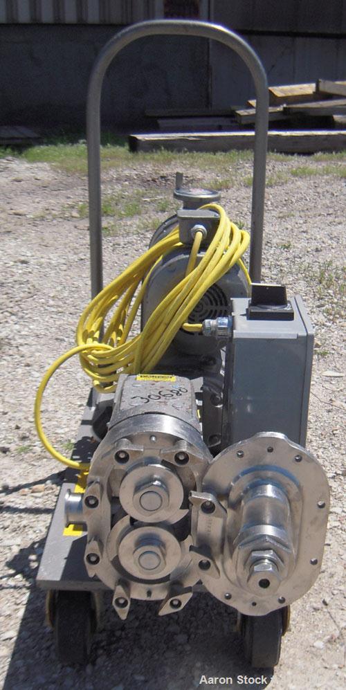Used Waukesha Rotary Positive Displacement Pump, Model 030, 316 Stainless Steel. Approximately 36 gallons per minute at 100 psi at 600 rpm capacity, (.06) gallon displacement per revolution. 1 1/2" t...