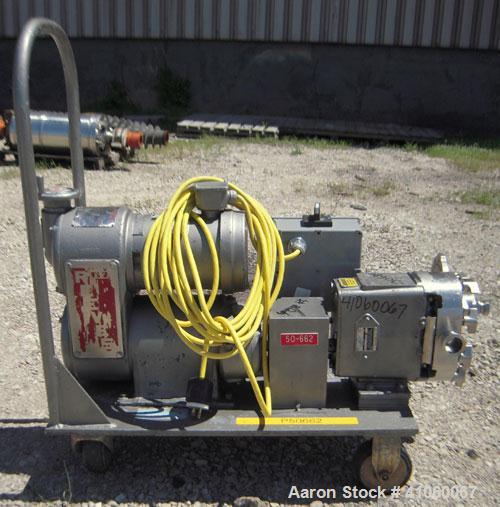 Used Waukesha Rotary Positive Displacement Pump, Model 030, 316 Stainless Steel. Approximately 36 gallons per minute at 100 psi at 600 rpm capacity, (.06) gallon displacement per revolution. 1 1/2" t...