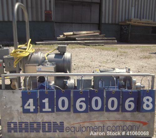 Used Waukesha Rotary Positive Displacement Pump, Model 030, 316 Stainless Steel. Approximately 36 gallons per minute at 100 psi at 600 rpm capacity, .06 gallon displacement per revolution. 1 1/2" tri...
