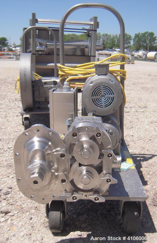 Used Waukesha Rotary Positive Displacement Pump, Model 030, 316 Stainless Steel. Approximately 36 gallons per minute at 100 psi at 600 rpm capacity, .06 gallon displacement per revolution. 1 1/2" tri...