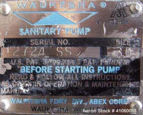 Used Waukesha Rotary Positive Displacement Pump, Model 030, 316 Stainless Steel. Approximately 36 gallons per minute at 100 psi at 600 rpm capacity, .06 gallon displacement per revolution. 1 1/2" tri...