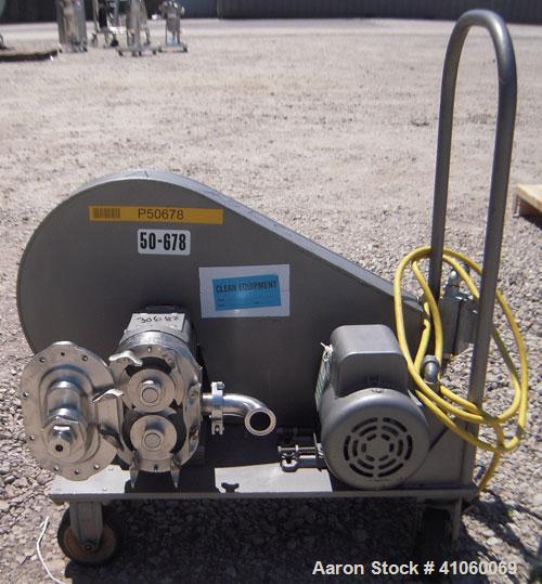 Used Waukesha Rotary Positive Displacement Pump, Model 30, 316 Stainless Steel. Approximately 36 gallons per minute at 100 psi at 600 rpm capacity, (.06) gallon displacement per revolution. 1 1/2" tr...