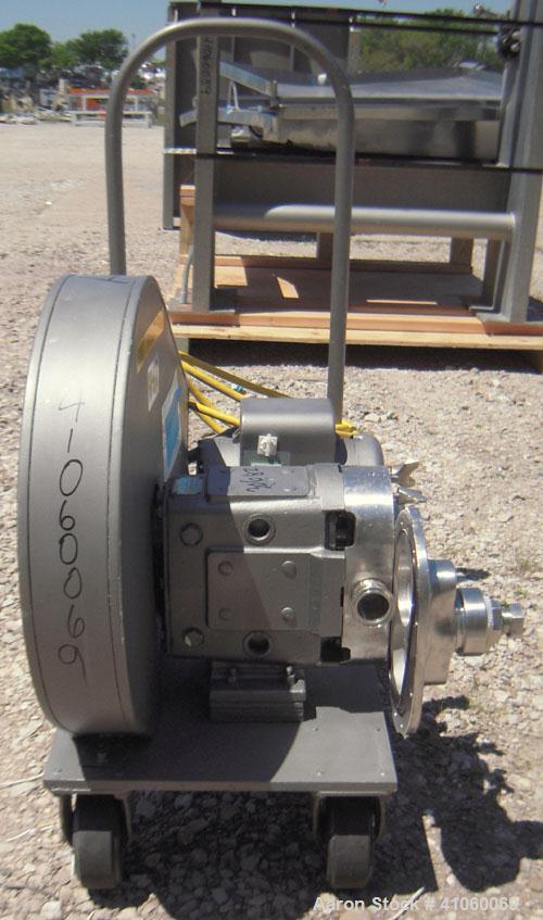 Used Waukesha Rotary Positive Displacement Pump, Model 30, 316 Stainless Steel. Approximately 36 gallons per minute at 100 psi at 600 rpm capacity, (.06) gallon displacement per revolution. 1 1/2" tr...