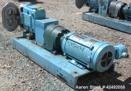 Used Waukesha Rotary Positive Displacement Pump, Model 30, 316 Stainless Steel. Approximately 36 gallons per minute at 100 psi at 600 rpm capacity, .06 gallon displacement per revolution. 1-1/2" Tri-...