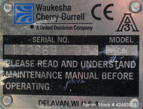Used Waukesha Rotary Positive Displacement Pump, Model 30, 316 Stainless Steel. Approximately 36 gallons per minute at 100 psi at 600 rpm capacity, .06 gallon displacement per revolution. 1-1/2" Tri-...
