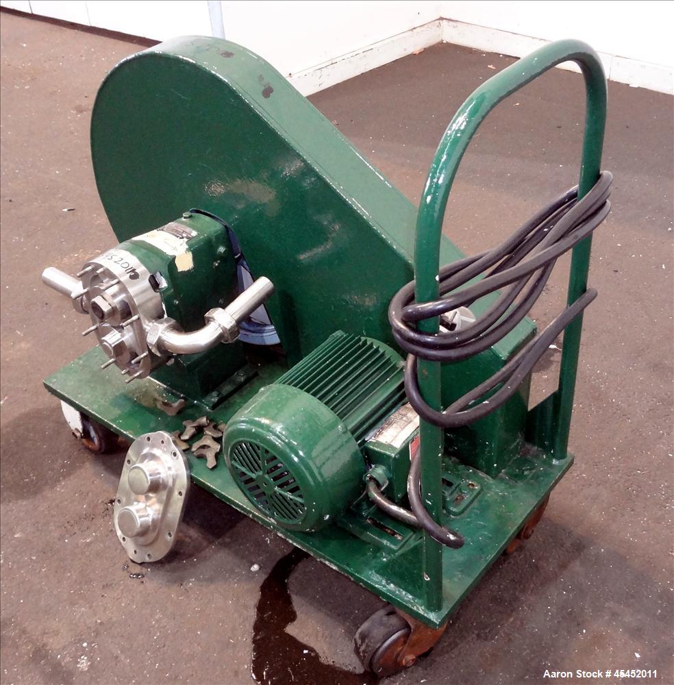 Used Waukesha Rotary Positive Displacement Pump, Model 030, 316 Stainless Steel. Approximately 36 gallons per minute at 100 psi at 600 rpm capacity. 2" Tri-clamp inlet/outlet, (2) 4 " diameter stainl...