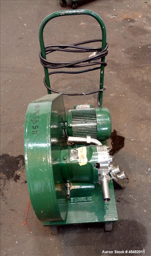 Used Waukesha Rotary Positive Displacement Pump, Model 030, 316 Stainless Steel. Approximately 36 gallons per minute at 100 psi at 600 rpm capacity. 2" Tri-clamp inlet/outlet, (2) 4 " diameter stainl...
