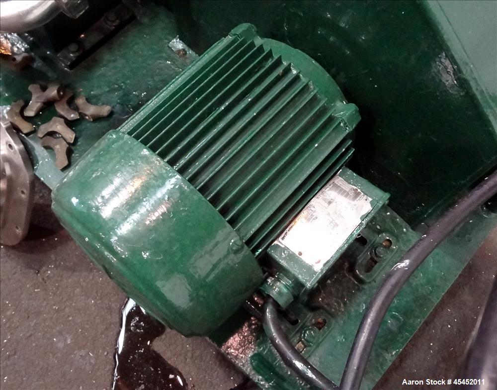 Used Waukesha Rotary Positive Displacement Pump, Model 030, 316 Stainless Steel. Approximately 36 gallons per minute at 100 psi at 600 rpm capacity. 2" Tri-clamp inlet/outlet, (2) 4 " diameter stainl...