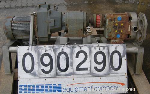 USED: Waukesha rotary positive displacement pump, model 030, 316stainless steel. Approximate capacity 36 gallons per minute at 600rpm. 1-1/2" tri clamp inlet/outlet. (2) Stainless steel rotors. Drive...