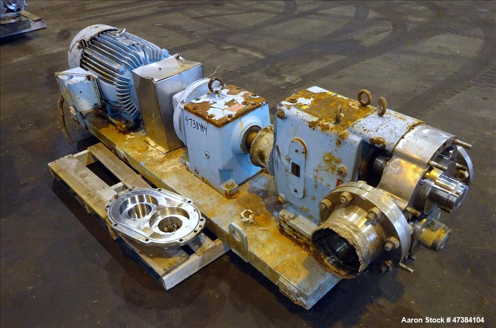 Used Waukesha Rotary Positive Displacement Pump, Model 320, 316 Stainless Steel. Approximately 450 gallons per minute at 200 psi at 600 rpm capacity, (0.754) gallon displacement per revolution. 6" In...