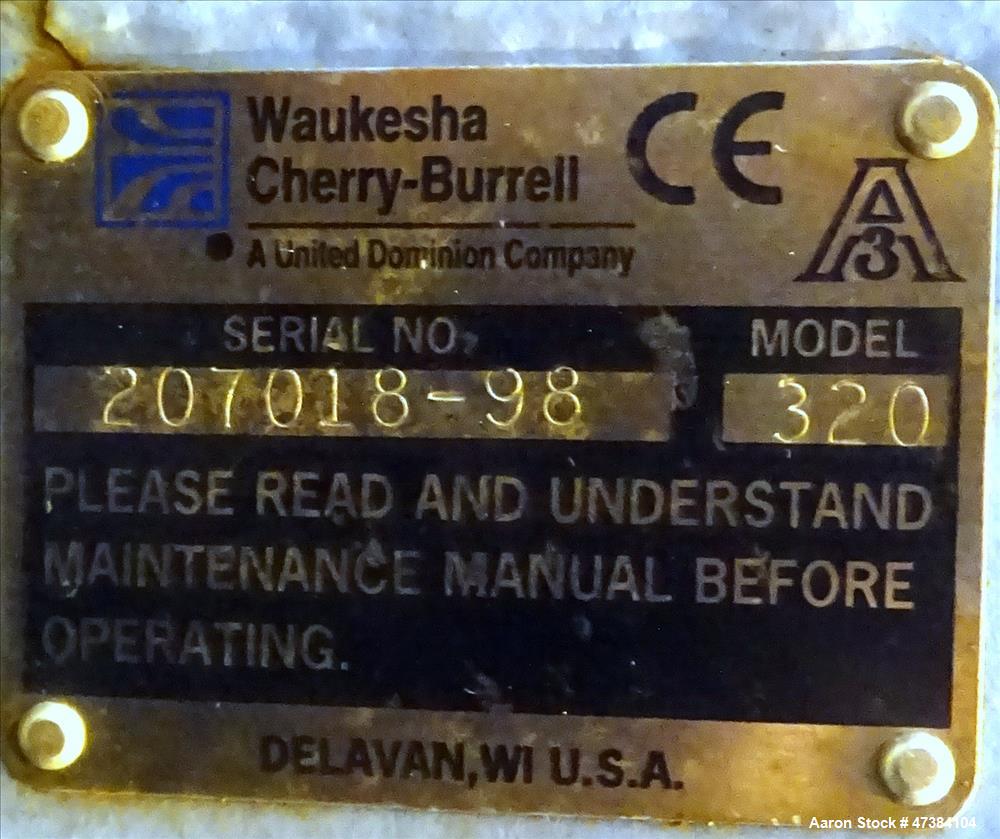 Used Waukesha Rotary Positive Displacement Pump, Model 320, 316 Stainless Steel. Approximately 450 gallons per minute at 200 psi at 600 rpm capacity, (0.754) gallon displacement per revolution. 6" In...