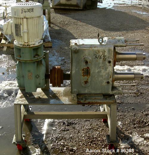 USED: Waukesha positive displacement pump parts consisting of (1) model 320 gear housing, (2) shafts and a 3 hp, 3/60/230/460 volt, 1725 rpm Dodge gearmotor, ratio 30. Mounted on a stainless steel st...