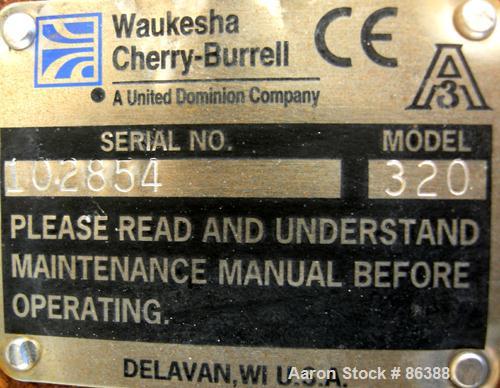 USED: Waukesha positive displacement pump parts consisting of (1) model 320 gear housing, (2) shafts and a 3 hp, 3/60/230/460 volt, 1725 rpm Dodge gearmotor, ratio 30. Mounted on a stainless steel st...