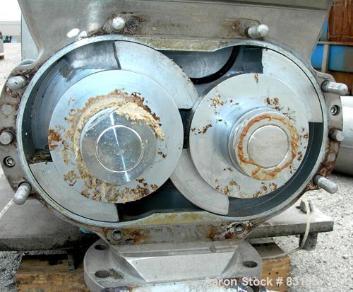 USED: Waukesha rectangular flange rotary positive displacement pump, model 324, 316 stainless steel. Approximately 300 gallons per minute, 75 gallons displacement per 100 revolutions. Top inlet with ...