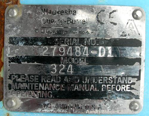 USED: Waukesha rectangular flange rotary positive displacement pump, model 324, 316 stainless steel. Approximately 300 gallons per minute, 75 gallons displacement per 100 revolutions. Top inlet with ...
