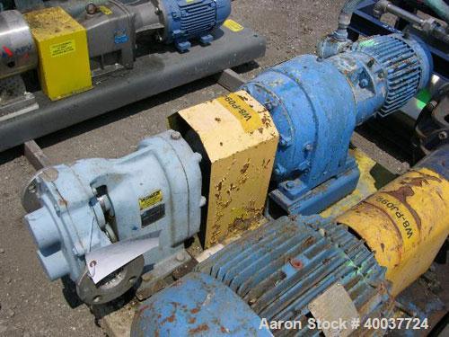 Used- Waukesha Rotary Lobe Pump, Model 55I, stainless steel construction, 2" inlet/outlet, rated up to 60 GPM, on base with ...