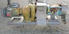 Used Waukesha Rectangular Flange Universal Rotary Positive Displacement Pumpmodel 224, 316 stainless steel. Approximately 200 gallons per minute at 200 psi at 400 rpm capacity, .522 gallon displaceme...