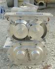 Used Waukesha Rectangular Flange Universal Rotary Positive Displacement Pumpmodel 224, 316 stainless steel. Approximately 200 gallons per minute at 200 psi at 400 rpm capacity, .522 gallon displaceme...