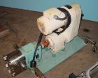 Used Waukesha rotary positive displacement pump, model 30, stainless steel. Approximate capacity 36 gallons per minute at 600 rpm. 1 1/2