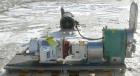 Used Tri-Clover Rotary Positive Displacement Pump, 316 stainless steel. Approximately 60 gallons per minute at 20 psi. 3