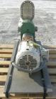 Used Tri-Clover Rotary Positive Displacement Pump, 316 stainless steel. Approximately 60 gallons per minute at 20 psi. 3