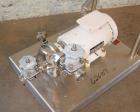 Used Cherry Burrell Model 4AK-F Flex Flo Stainless Pump. 1 in inlet / outlet, 2 hp, 208-230/460 motor, stainless steel cart.