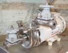 Used Cherry Burrell Model 4AK-F Flex Flo Stainless Pump. 1 in inlet / outlet, 2 hp, 208-230/460 motor, stainless steel cart.